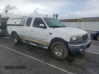 2002 Ford F-150 XL with VIN 1FTRX17LX2KB25894, listed as a Copart auction lot 49283405 with 247,998 mi miles and Salvage title. Bid and sale history available at DreamBid. Image 4.