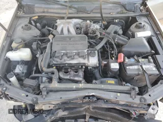 1999 Toyota Camry LE z VIN JT2BF22K0X0167589, wystawiony jako Copart lot #42699015 z przebiegiem 198 634 mil mil oraz Czysty tytuł • Clean title. Historia ofert i sprzedaży dostępna na DreamBid. Obrazek 11.