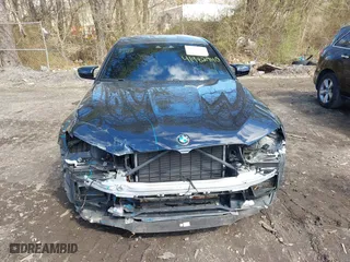 2020 BMW M5 with VIN WBSJF0C05LCE51499, listed as a IAAI auction lot 41982940 with 47,076 mi miles. Bid and sale history available at carsss.com. Image 12.