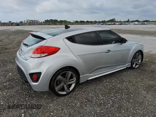 2014 Hyundai Veloster Turbo with VIN KMHTC6AE0EU211034, listed as a Copart auction lot 49711635 with 126,394 mi miles and Clean title. Bid and sale history available at DreamBid. Image 3.