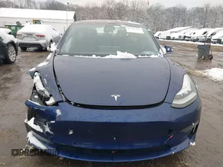2018 Tesla Model 3 Long Range Battery z VIN 5YJ3E1EA5JF006370, wystawiony jako IAAI lot #41565266 z przebiegiem 55 376 mil mil oraz . Historia ofert i sprzedaży dostępna na DreamBid. Obrazek 12.