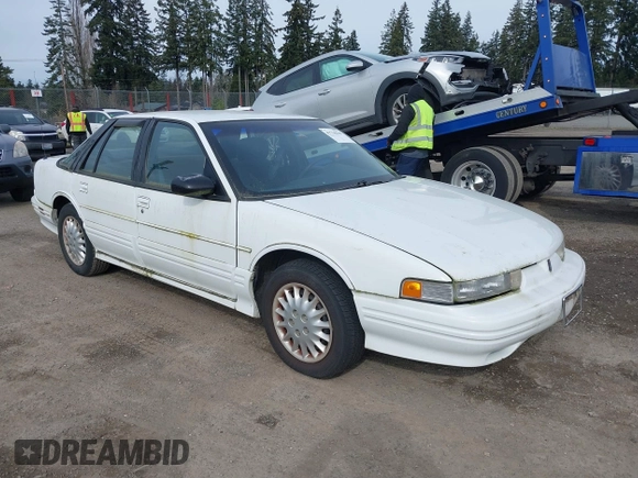 1996 Oldsmobile Cutlass Supreme S z VIN 1G3WH52M6TF328427, wystawiony jako IAAI lot #41718618 z przebiegiem 104 914 mil mil oraz . Historia ofert i sprzedaży dostępna na DreamBid. Obrazek 1.