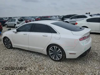 2018 Lincoln MKZ Hybrid Reserve with VIN 3LN6L5MU5JR605267, listed as a Copart auction lot 82823214 with 89,552 mi miles and Salvage title. Bid and sale history available at DreamBid. Image 2.