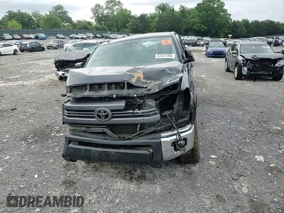 2014 Toyota Tundra SR5 with VIN 5TFEY5F14EX165589, listed as a Copart auction lot 57311785 with 165,343 mi miles and Salvage title. Bid and sale history available at DreamBid. Image 14.