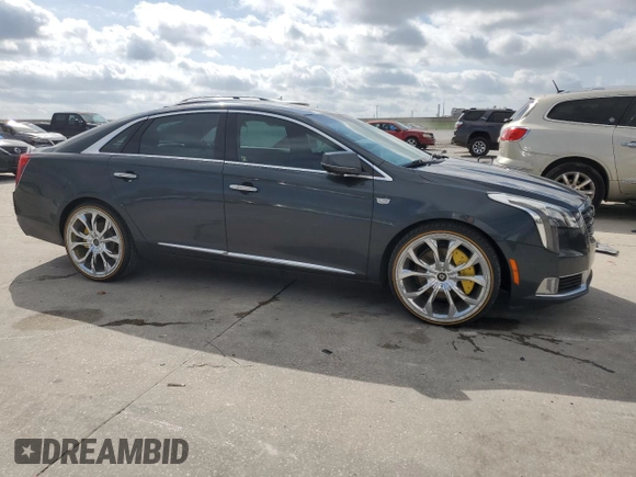 2018 Cadillac XTS Luxury z VIN 2G61M5S30J9135292, wystawiony jako Copart lot #57121115 z przebiegiem 95 110 mil mil oraz Szkoda całkowita • Salvage title. Historia ofert i sprzedaży dostępna na DreamBid. Obrazek 4.