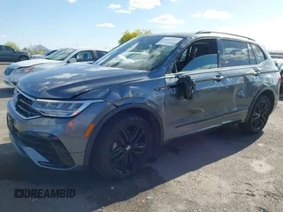 2022 Volkswagen Tiguan SE R-Line Black with VIN 3VV8B7AX4NM154637, listed as a IAAI auction lot 42058531 with 39,597 mi miles and . Bid and sale history available at DreamBid. Image 2.