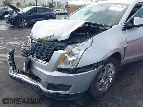 2016 Cadillac SRX Luxury Collection z VIN 3GYFNBE38GS520891, wystawiony jako IAAI lot #41781445 z przebiegiem 52 202 mil mil oraz . Historia ofert i sprzedaży dostępna na DreamBid. Obrazek 12.