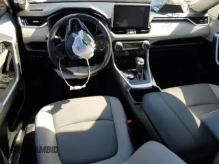 2023 Toyota RAV4 Hybrid XLE Premium z VIN JTMB6RFV8PD115723, wystawiony jako Copart lot #88005175 z przebiegiem 18 363 mil mil oraz Szkoda całkowita • Salvage title. Historia ofert i sprzedaży dostępna na DreamBid. Obrazek 8.