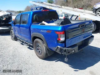 2025 Nissan Frontier PRO-4X with VIN 1N6ED1EK0SN614348, listed as a IAAI auction lot 41826627 with 6,931 mi miles. Bid and sale history available at carsss.com. Image 3.
