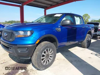 2020 Ford Ranger XL z VIN 1FTER4EH2LLA29701, wystawiony jako IAAI lot #40500058 z przebiegiem 112 506 mil mil oraz . Historia ofert i sprzedaży dostępna na DreamBid. Obrazek 2.