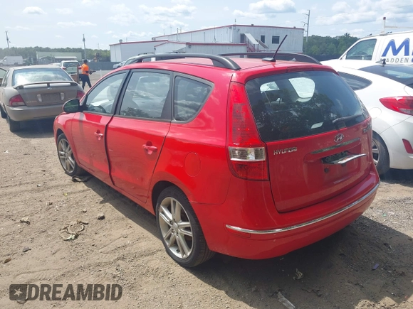 2010 Hyundai Elantra Touring SE with VIN KMHDC8AE2AU075841, listed as a IAAI auction lot 40128211 with 173,541 mi miles. Bid and sale history available at carsss.com. Image 3.