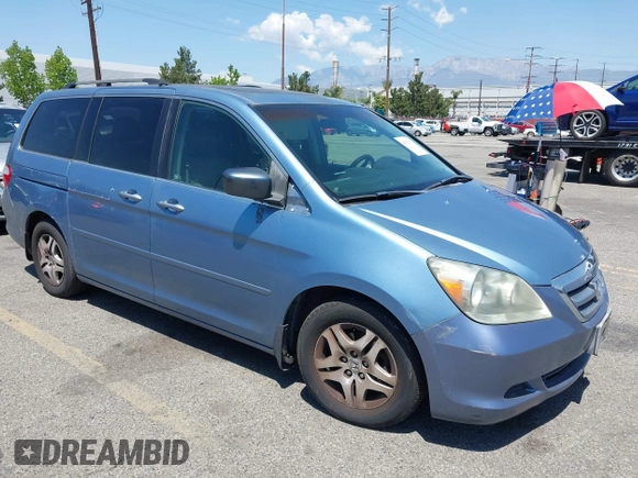 2005 Honda Odyssey EX-L with VIN 5FNRL38785B110823, listed as a IAAI auction lot 42154177 with 195,298 mi miles. Bid and sale history available at carsss.com. Image 1.
