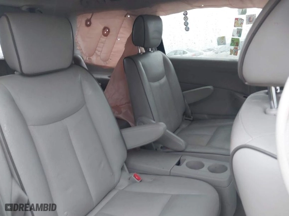 2015 Nissan Quest SV with VIN JN8AE2KP8F9132170, listed as a IAAI auction lot 41570736 with 117,319 mi miles. Bid and sale history available at carsss.com. Image 8.