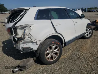 2013 Mazda CX-9 Touring z VIN JM3TB3CV1D0402512, wystawiony jako Copart lot #54436745 z przebiegiem Nie podano mil oraz Szkoda całkowita • Salvage title. Historia ofert i sprzedaży dostępna na DreamBid. Obrazek 3.