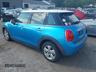 2015 MINI Hardtop 4 Door z VIN WMWXS5C51FT829693, wystawiony jako IAAI lot #42497639 z przebiegiem 36 494 mil mil oraz . Historia ofert i sprzedaży dostępna na DreamBid. Obrazek 3.
