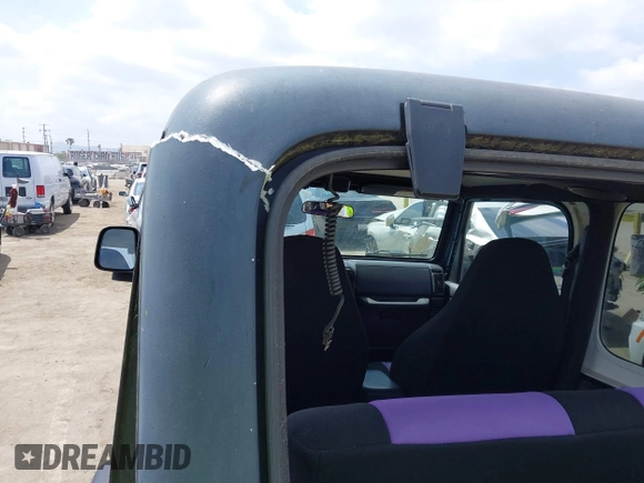 2002 Jeep Wrangler X with VIN 1J4FA39S32P738246, listed as a IAAI auction lot 42106359 with 266,993 mi miles and . Bid and sale history available at DreamBid. Image 18.