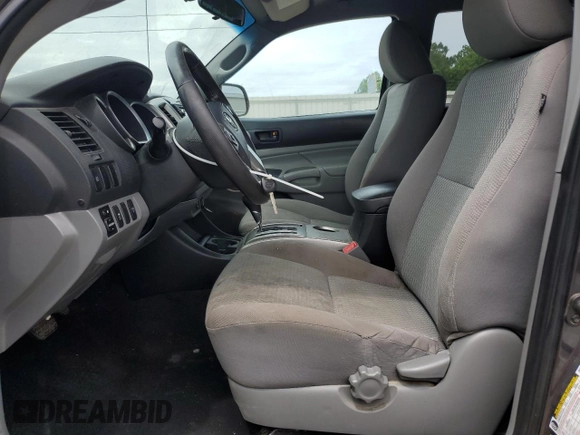 2014 Toyota Tacoma with VIN 3TMLU4EN3EM134468, listed as a Copart auction lot 60686435 with 154,926 mi miles and Salvage title. Bid and sale history available at DreamBid. Image 7.