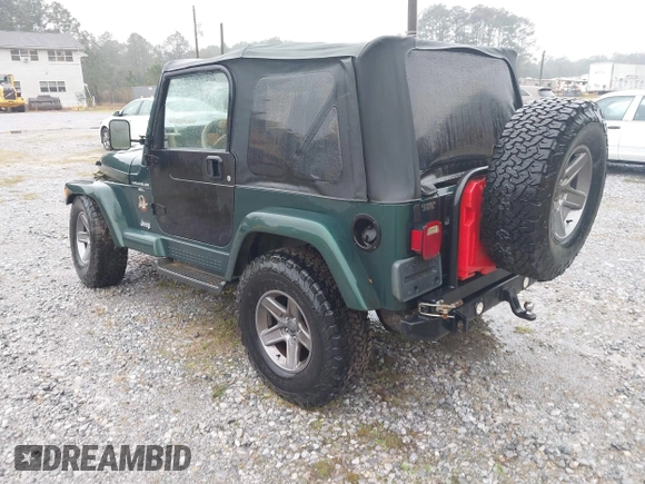 2000 Jeep Wrangler Sahara with VIN 1J4FA59SXYP701098, listed as a IAAI auction lot 41592872 with 1 mi miles. Bid and sale history available at carsss.com. Image 3.