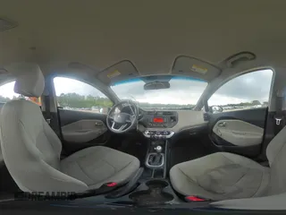 2015 Kia Rio LX with VIN KNADM4A36F6461146, listed as a Copart auction lot 54969204 with 74,501 mi miles and Salvage Title. Bid and sale history available at carsss.com. Image 12.