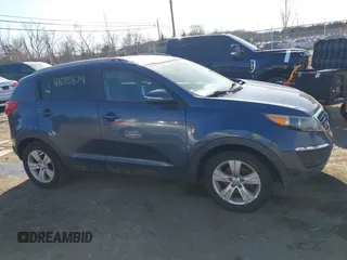 2012 Kia Sportage LX with VIN KNDPB3A22C7306154, listed as a IAAI auction lot 41675874 with 130,837 mi miles. Bid and sale history available at carsss.com. Image 13.