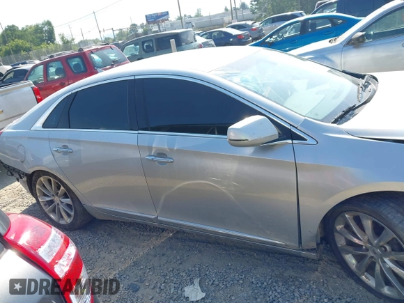 2013 Cadillac XTS Luxury z VIN 2G61R5S38D9228339, wystawiony jako IAAI lot #42664948 z przebiegiem 105 917 mil mil oraz . Historia ofert i sprzedaży dostępna na DreamBid. Obrazek 14.