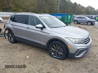 2022 Volkswagen Tiguan SE with VIN 3VV3B7AX5NM148193, listed as a IAAI auction lot 40795694 with 62,828 mi miles and . Bid and sale history available at DreamBid. Image 1.