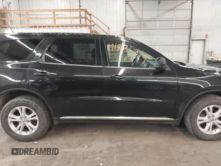 2013 Dodge Durango SXT with VIN 1C4RDJAG0DC512293, listed as a IAAI auction lot 41875919 with 191,128 mi miles and . Bid and sale history available at DreamBid. Image 14.