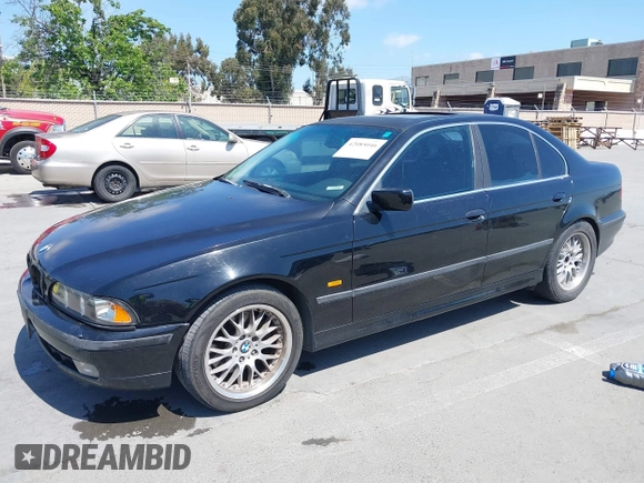 1997 BMW 5 Series 540iA with VIN WBADE6325VBW55346, listed as a IAAI auction lot 42085046 with 216,212 mi miles. Bid and sale history available at carsss.com. Image 2.