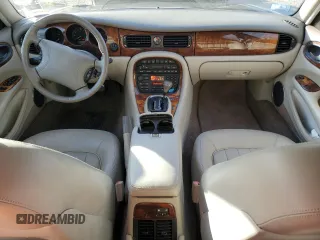 1998 Jaguar XJ with VIN SAJHX1248WC853422, listed as a Copart auction lot 80614724 with 76,269 mi miles and Non repairable. Bid and sale history available at DreamBid. Image 8.