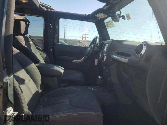 2015 Jeep Wrangler Sahara with VIN 1C4AJWBG5FL733795, listed as a Copart auction lot 61998255 with 86,655 mi miles and Salvage title. Bid and sale history available at DreamBid. Image 10.