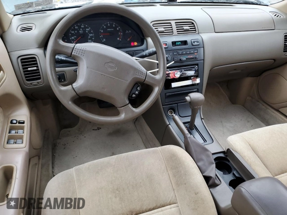 1998 Nissan Maxima GXE with VIN JN1CA21D1WT607137, listed as a Copart auction lot 43629285 with 159,196 mi miles and Salvage title. Bid and sale history available at DreamBid. Image 8.