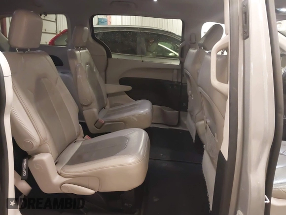 2018 Chrysler Pacifica Touring L with VIN 2C4RC1BG3JR330401, listed as a IAAI auction lot 41250303 with 86,975 mi miles and . Bid and sale history available at DreamBid. Image 8.