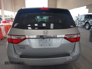 2012 Honda Odyssey EX-L with VIN 5FNRL5H67CB005013, listed as a IAAI auction lot 42295586 with 200,611 mi miles and . Bid and sale history available at DreamBid. Image 16.