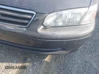 2000 Toyota Camry CE z VIN JT2BG28K3Y0513835, wystawiony jako IAAI lot #42309937 z przebiegiem 132 572 mil mil oraz . Historia ofert i sprzedaży dostępna na DreamBid. Obrazek 17.