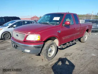 2000 Ford F-150 XL with VIN 1FTRX18W2YNB60283, listed as a IAAI auction lot 41510168 with 237,825 mi miles. Bid and sale history available at carsss.com. Image 2.