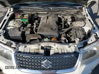 2012 Suzuki Grand Vitara Premium z VIN JS3TD0D64C4100245, wystawiony jako Copart lot #71365134 z przebiegiem 100 501 mil mil oraz Szkoda całkowita • Salvage title. Historia ofert i sprzedaży dostępna na DreamBid. Obrazek 12.