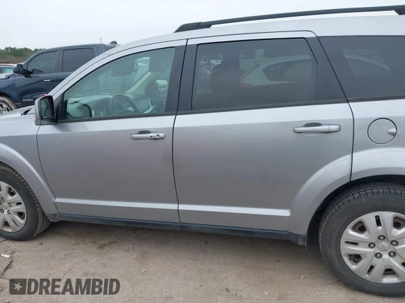 2019 Dodge Journey SE with VIN 3C4PDCBB0KT816103, listed as a IAAI auction lot 41640272 with 118,310 mi miles and . Bid and sale history available at DreamBid. Image 14.