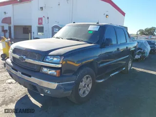 2005 Chevrolet Avalanche Z71 with VIN 3GNEK12Z65G207469, listed as a IAAI auction lot 41210152 with 297,282 mi miles. Bid and sale history available at carsss.com. Image 2.