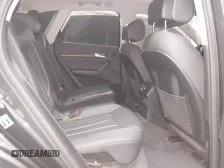 2021 Audi Q5 Premium Plus z VIN WA1BAAFY6M2130300, wystawiony jako IAAI lot #42250661 z przebiegiem 49 147 mil mil oraz . Historia ofert i sprzedaży dostępna na DreamBid. Obrazek 8.