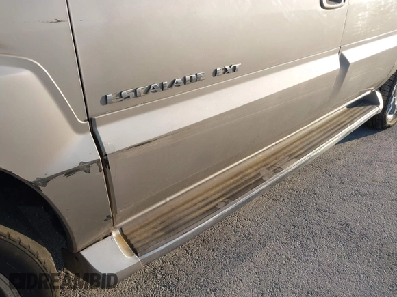 2004 Cadillac Escalade EXT z VIN 3GYEK62NX4G291260, wystawiony jako IAAI lot #41995991 z przebiegiem Nie podano mil oraz . Historia ofert i sprzedaży dostępna na DreamBid. Obrazek 13.