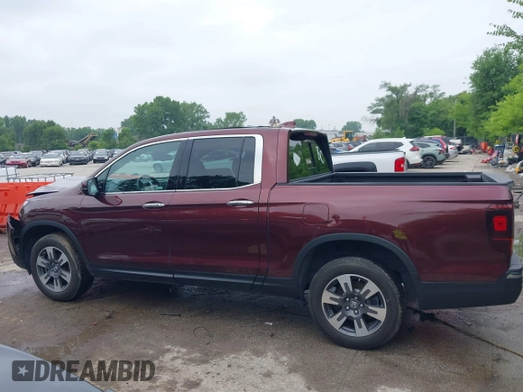 2019 Honda Ridgeline RTL-E with VIN 5FPYK3F78KB004781, listed as a IAAI auction lot 42425646 with 147,695 mi miles and . Bid and sale history available at DreamBid. Image 14.