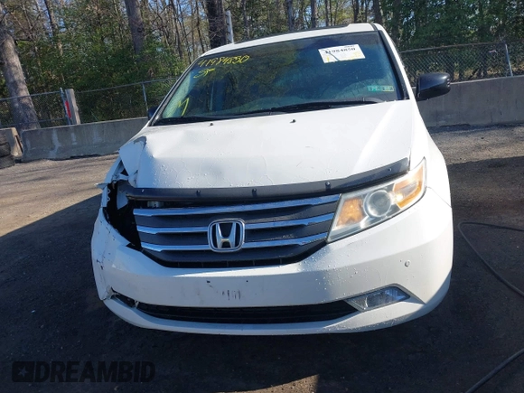 2012 Honda Odyssey Touring with VIN 5FNRL5H93CB146753, listed as a IAAI auction lot 41984850 with 155,309 mi miles and . Bid and sale history available at DreamBid. Image 12.