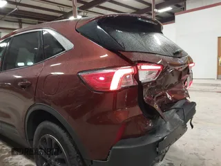 2021 Ford Escape SE with VIN 1FMCU9G69MUA91893, listed as a IAAI auction lot 42313453 with 71,278 mi miles and . Bid and sale history available at DreamBid. Image 6.