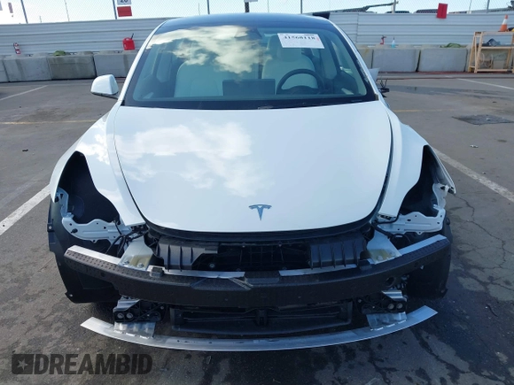 2023 Tesla Model 3 with VIN 5YJ3E1EA6PF495631, listed as a IAAI auction lot 41568118 with 10,073 mi miles and . Bid and sale history available at DreamBid. Image 13.