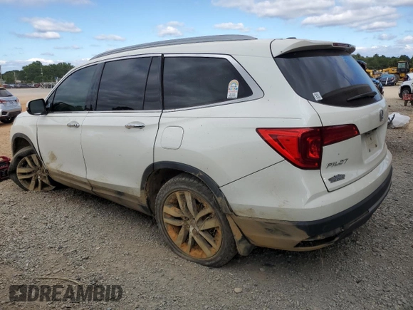 2017 Honda Pilot Touring z VIN 5FNYF6H92HB067140, wystawiony jako Copart lot #72200584 z przebiegiem 127 856 mil mil oraz Szkoda całkowita • Salvage title. Historia ofert i sprzedaży dostępna na DreamBid. Obrazek 2.