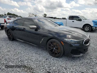 2020 BMW 8 Series M850i z VIN WBAGV8C06LBP48901, wystawiony jako Copart lot #57595725 z przebiegiem 88 332 mil mil oraz Tytuł czysty. Historia ofert i sprzedaży dostępna na DreamBid. Obrazek 4.