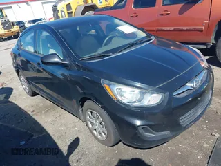 2012 Hyundai Accent GLS with VIN KMHCT4AE3CU265199, listed as a IAAI auction lot 41826958 with 121,618 mi miles. Bid and sale history available at carsss.com. Image 1.