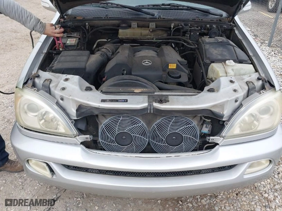 2004 Mercedes-Benz M-Class 3.5L with VIN 4JGAB57E74A510161, listed as a IAAI auction lot 41532823 with 149,456 mi miles. Bid and sale history available at carsss.com. Image 10.