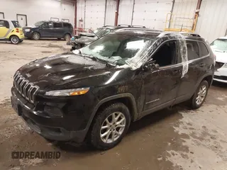 2017 Jeep Cherokee Latitude with VIN 1C4PJMCS0HW608416, listed as a IAAI auction lot 41523580 with 63,561 mi miles. Bid and sale history available at carsss.com. Image 2.
