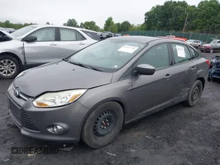 2012 Ford Focus SE z VIN 1FAHP3F29CL442731, wystawiony jako IAAI lot #42517796 z przebiegiem 148 728 mil mil oraz . Historia ofert i sprzedaży dostępna na DreamBid. Obrazek 17.